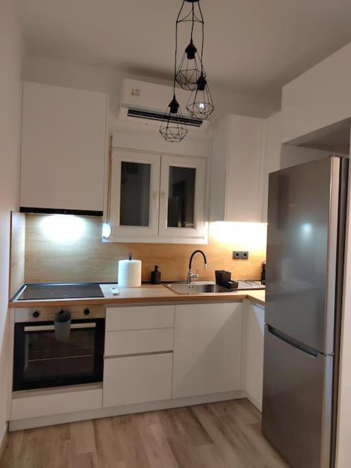 Cosy House With Garden Apartment Волос Екстериор снимка